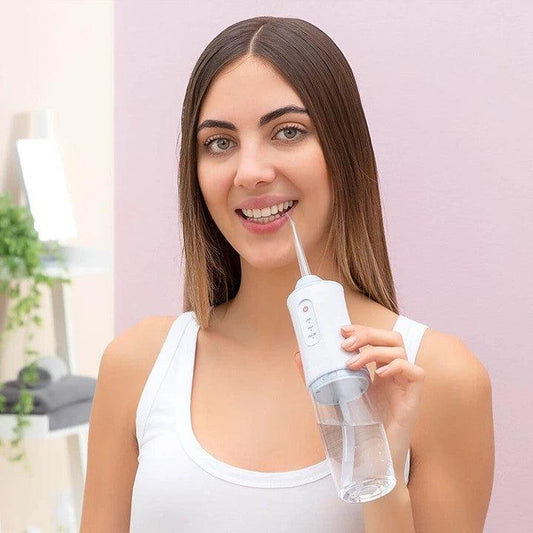 Irrigador Dental Portátil – Sin residuos, sin mal aliento – 🏷️ 40% DCTO – Solo por Hoy.